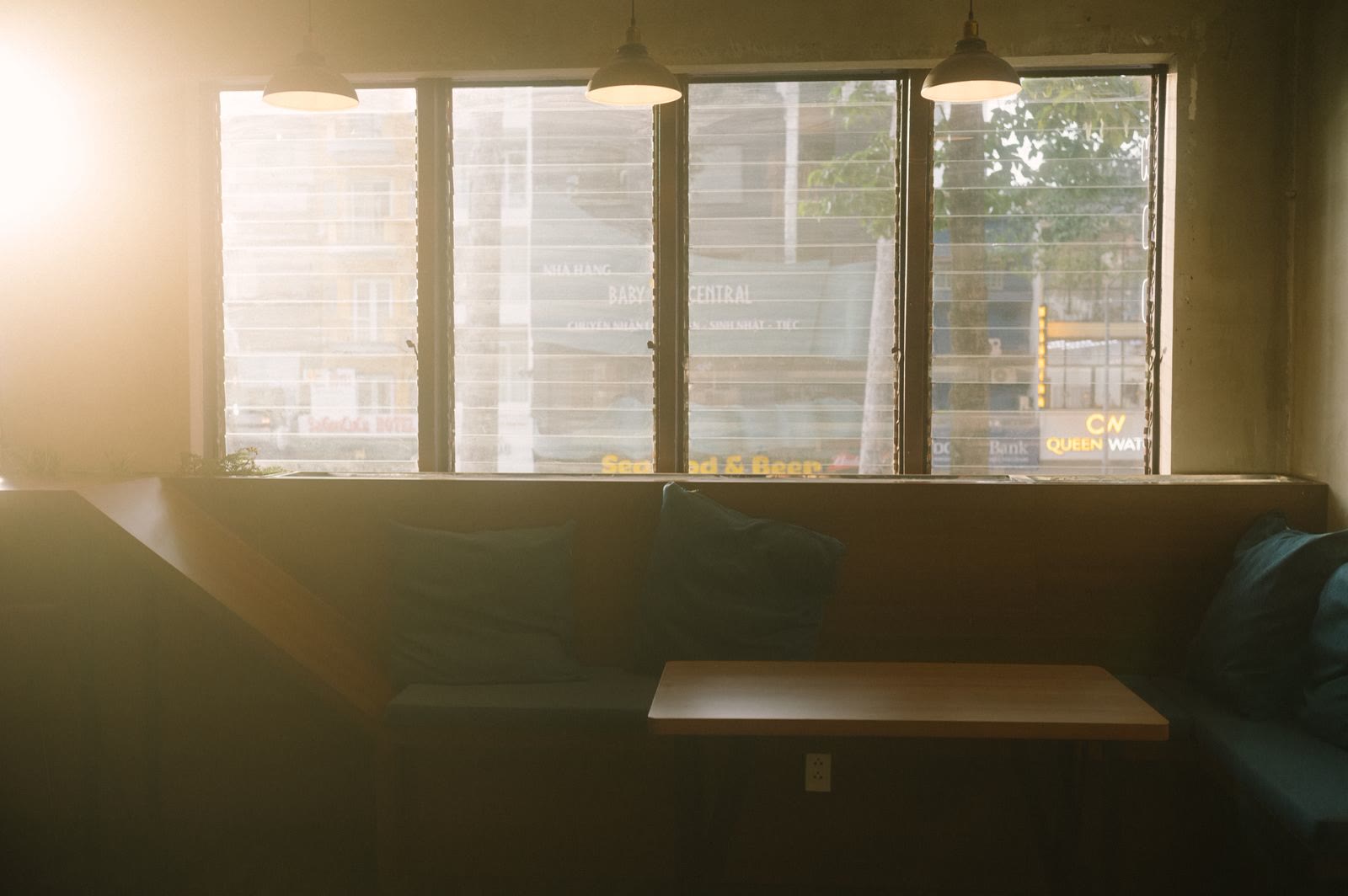 Sunlight streaming into a window booth