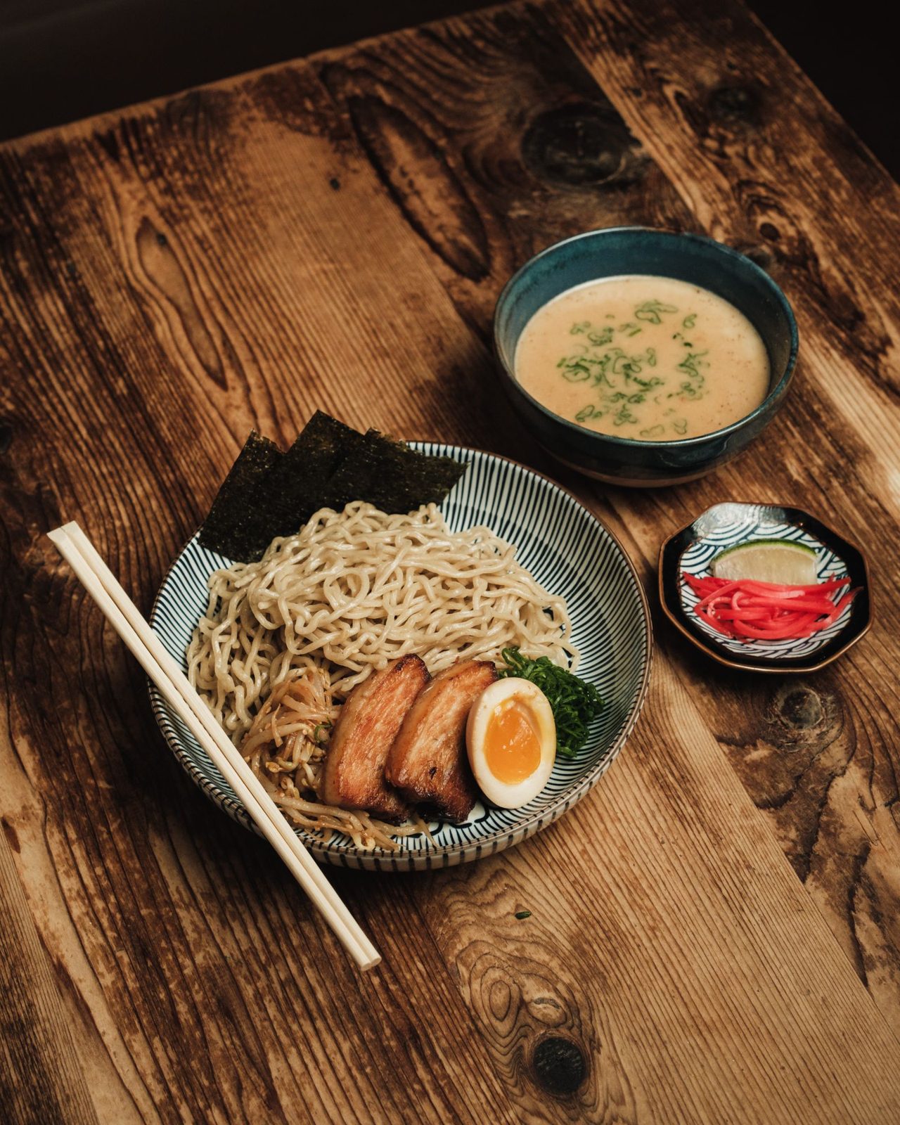 Dipping noodles with pork, egg and a bowl of rich broth