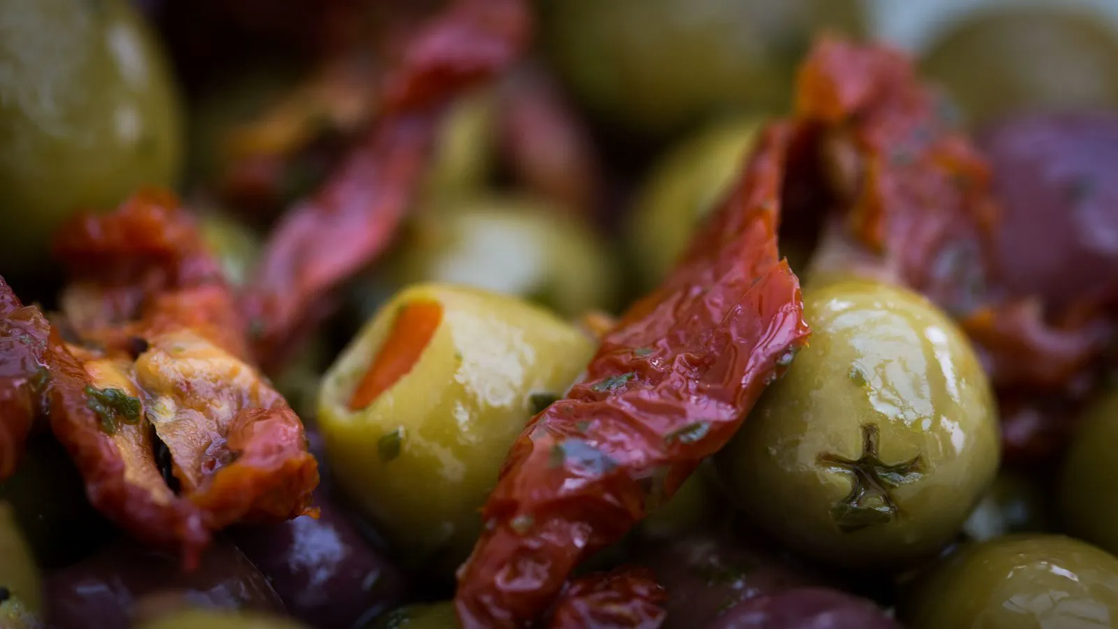 Green olives tossed with sun dried tomatoes