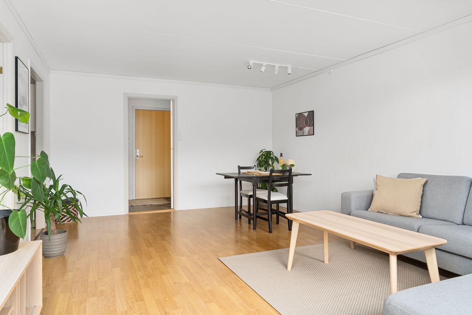 Light living room with a natural oak strip floor